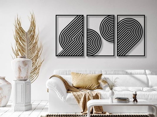 Modern living room with white sofa, decorative pillows, and abstract wall art.